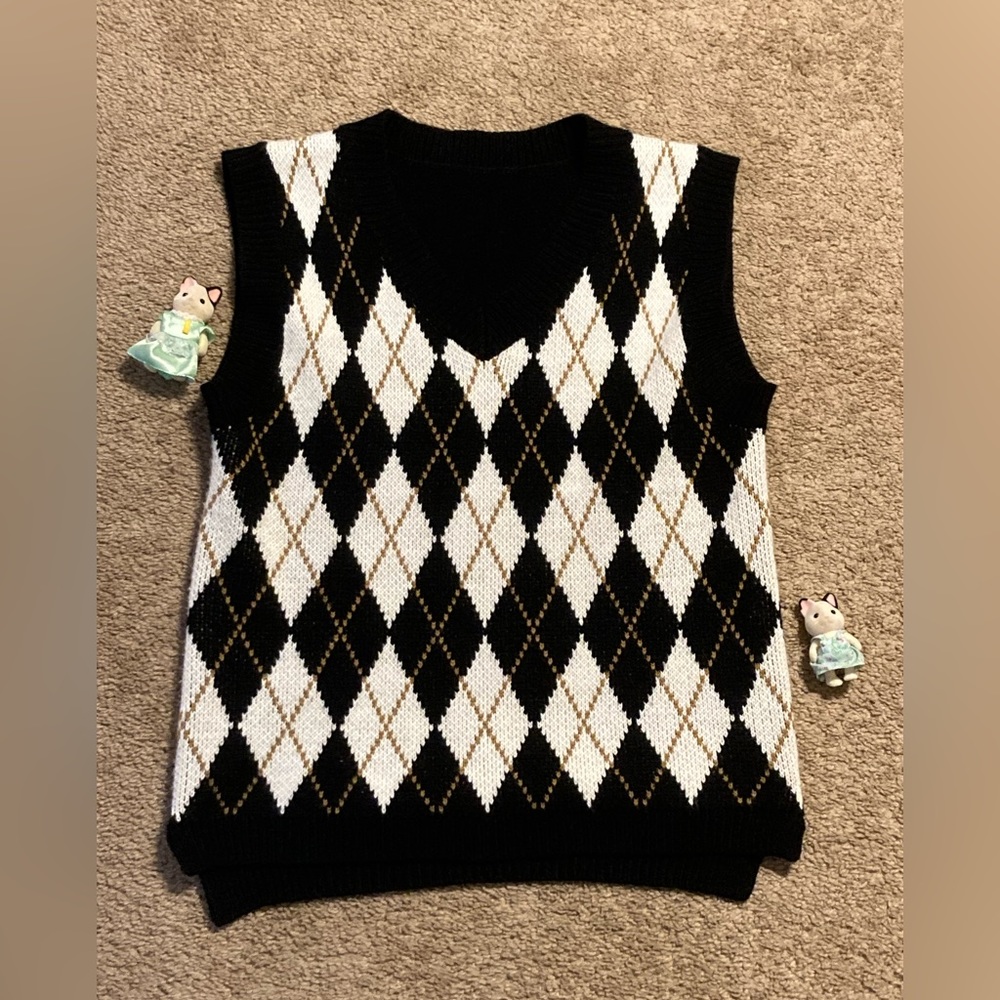 black sweater vest